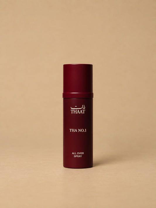 THA NO.1 من ذات — بخاخ All Over Spray بعبوة عنابية — خلفية بيج