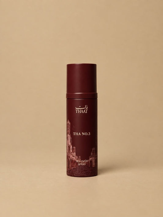 THA NO.3 من ذات — بخاخ All Over Spray بعبوة عنابية ونقوش معمارية — خلفية بيج