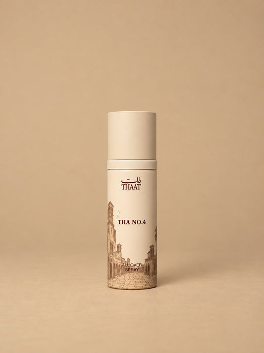 THA NO.4 من ذات — بخاخ All Over Spray بعبوة كريمية ونقوش معمارية — خلفية بيج